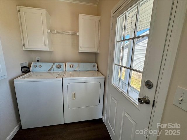 436 Riverwind Dr, Hendersonville, NC 28739 - washroom featuring cabinets, dark hardwood / wood-style floors, and washing machine and clothes dryer