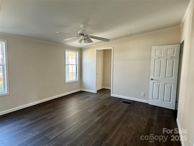 436 Riverwind Dr, Hendersonville, NC 28739 - unfurnished bedroom featuring crown molding, dark hardwood / wood-style floors, and ceiling fan