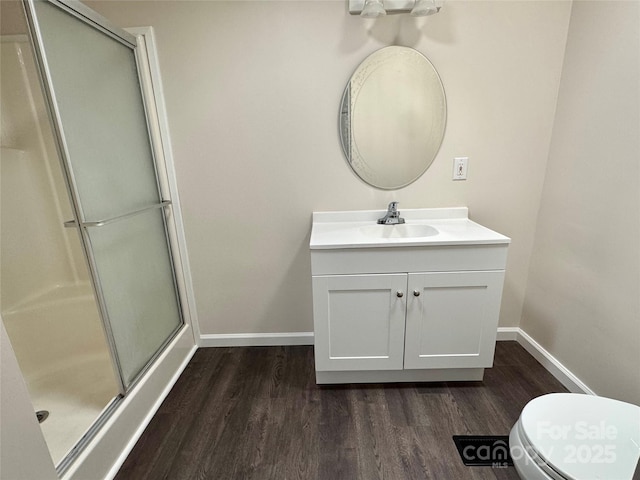 436 Riverwind Dr, Hendersonville, NC 28739 - bathroom with vanity, hardwood / wood-style flooring, toilet, and walk in shower