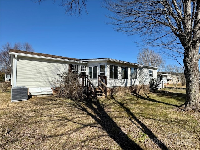 436 Riverwind Dr, Hendersonville, NC 28739 - exterior space with a yard and central air condition unit