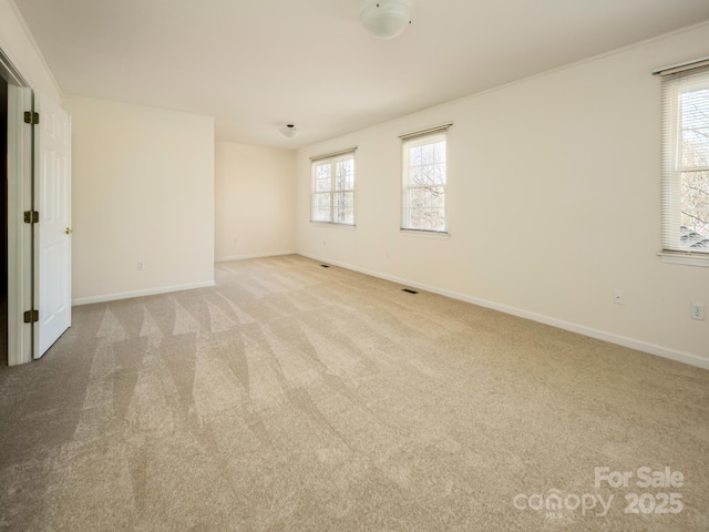 view of carpeted spare room