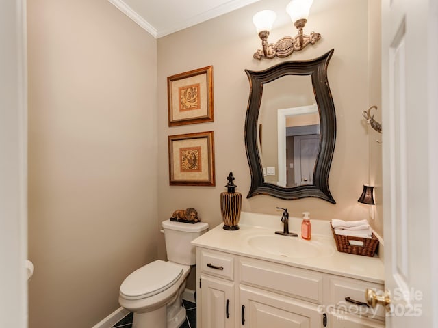 bathroom featuring vanity, a notable chandelier, crown molding, and toilet