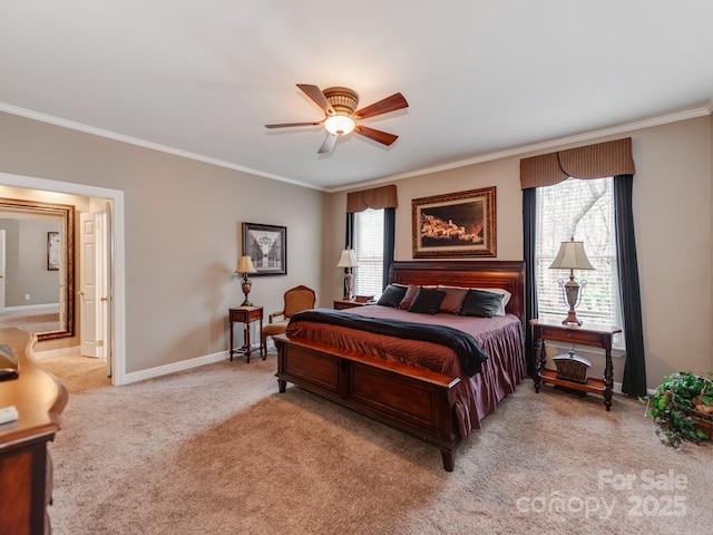 carpeted bedroom with crown molding and ceiling fan