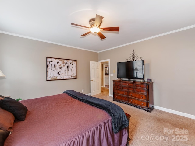 bedroom with ornamental molding, light colored carpet, and ceiling fan