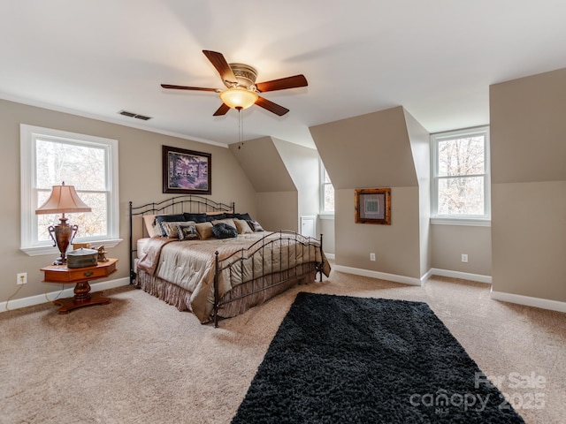 bedroom featuring ceiling fan, light colored carpet, and lofted ceiling