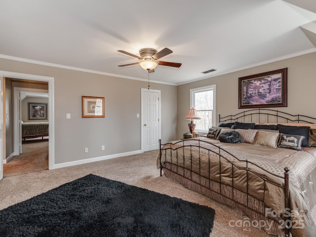 carpeted bedroom featuring ceiling fan and ornamental molding