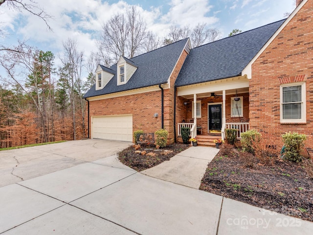 view of front of property featuring a garage and covered porch