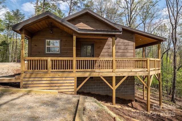 view of front of home with a deck