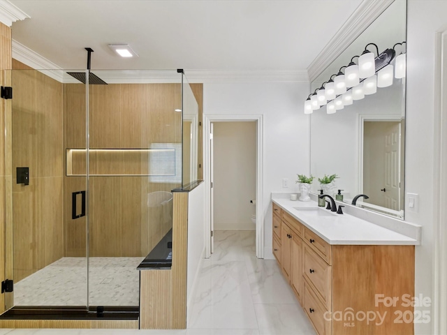 bathroom with toilet, marble finish floor, a stall shower, crown molding, and vanity