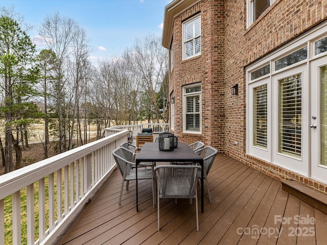 deck featuring outdoor dining space