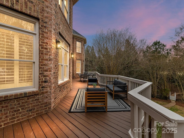 wooden deck featuring an outdoor living space