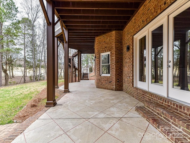 view of patio featuring stairs