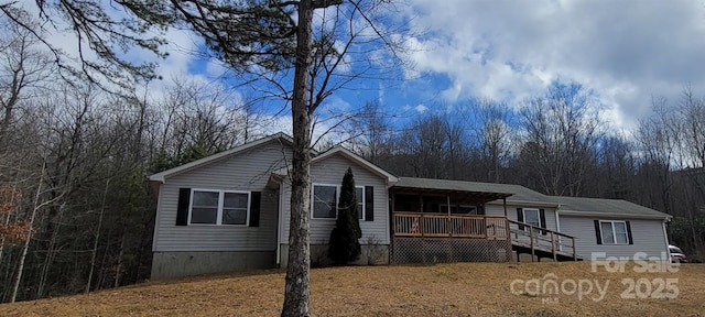 view of front of house featuring a deck