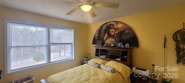 bedroom featuring ceiling fan