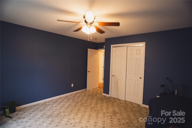 25 Upland Rd, Brevard, NC 28712 - unfurnished bedroom featuring a closet, carpet floors, baseboards, and ceiling fan