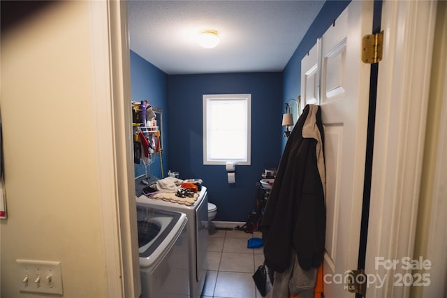 25 Upland Rd, Brevard, NC 28712 - washroom with washer and clothes dryer, light tile patterned floors, baseboards, and a textured ceiling