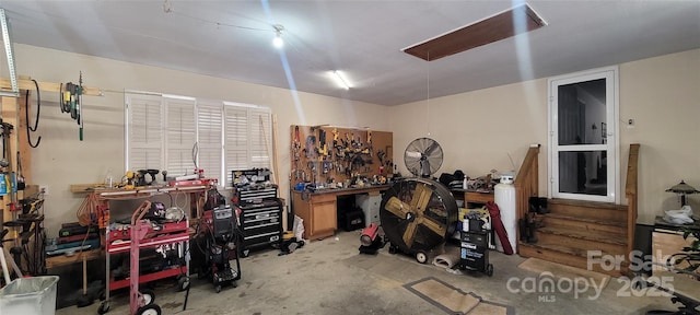 25 Upland Rd, Brevard, NC 28712 - misc room with a workshop area and unfinished concrete flooring