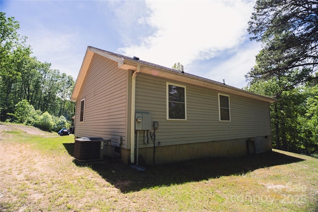25 Upland Rd, Brevard, NC 28712 - view of side of home featuring central air condition unit and a lawn