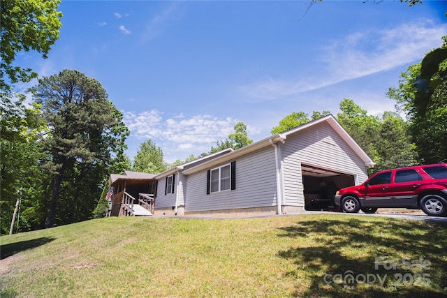 25 Upland Rd, Brevard, NC 28712 - view of side of property with a yard and a garage
