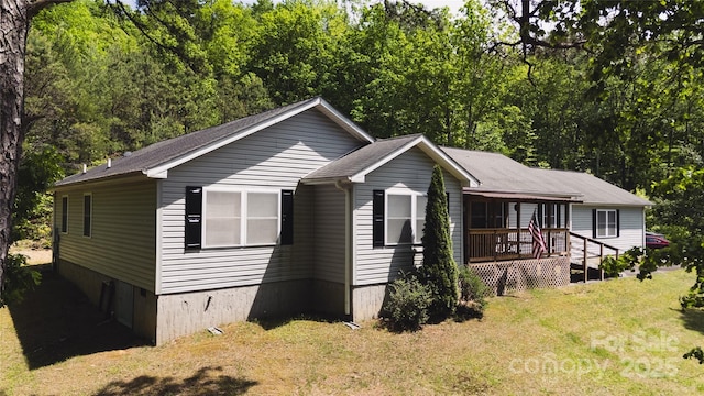 25 Upland Rd, Brevard, NC 28712 - view of front of property with a front yard and a deck