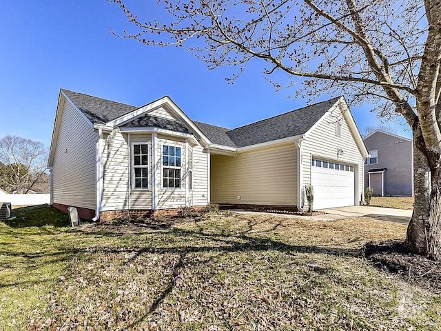 ranch-style house with a garage, central AC, and a front yard