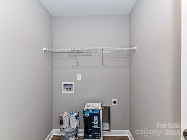 laundry area with hookup for a washing machine, hardwood / wood-style floors, and electric dryer hookup