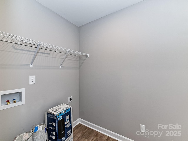 washroom featuring hookup for a washing machine, hookup for an electric dryer, and hardwood / wood-style flooring