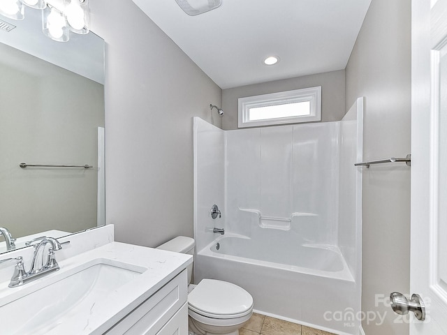 full bathroom featuring shower / tub combination, vanity, tile patterned floors, and toilet