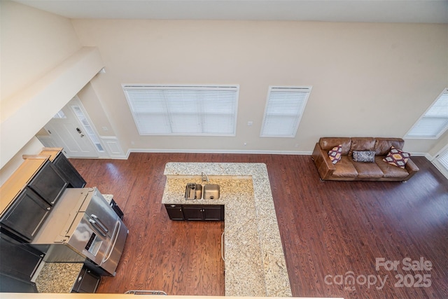 living room featuring dark wood-type flooring