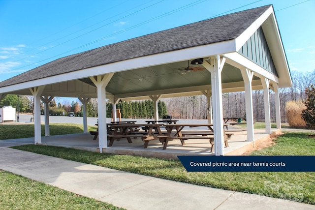 surrounding community with a gazebo and a lawn