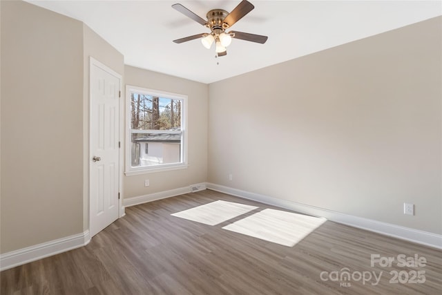 unfurnished room featuring hardwood / wood-style floors and ceiling fan