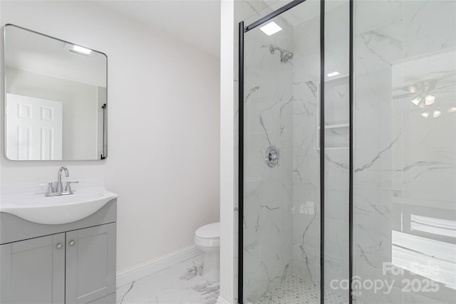 bathroom featuring vanity, toilet, and walk in shower