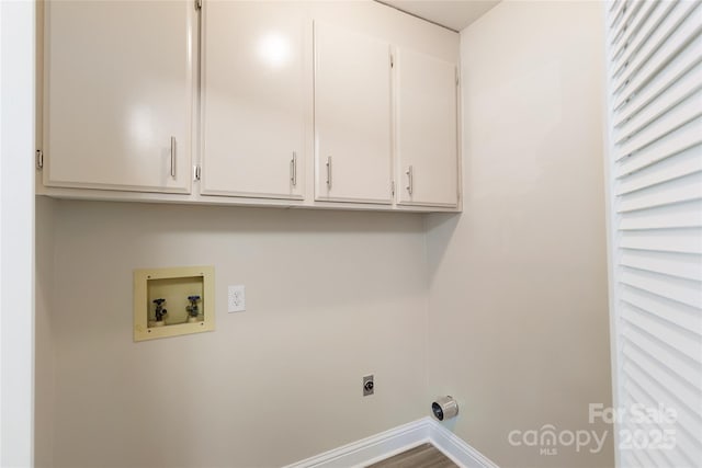 laundry area with washer hookup, cabinets, and hookup for an electric dryer