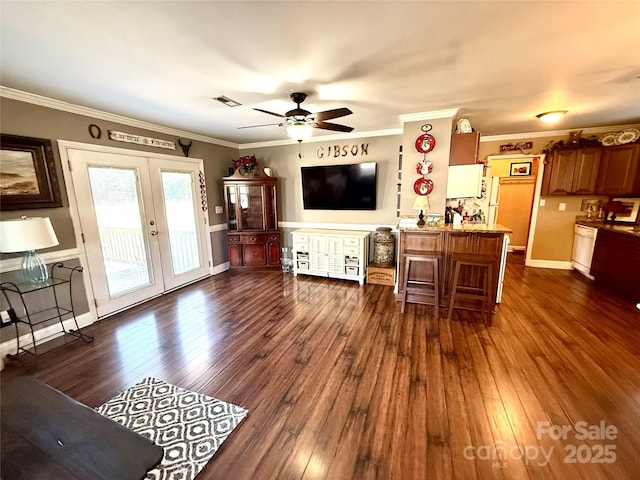 living room with french doors, ceiling fan, dark hardwood / wood-style floors, and crown molding