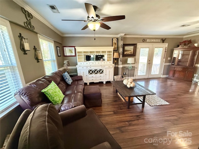 living room with french doors, ornamental molding, wood-type flooring, and ceiling fan