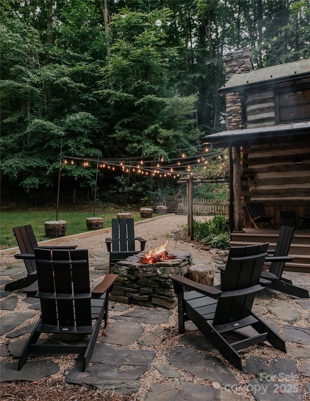 view of patio featuring a fire pit