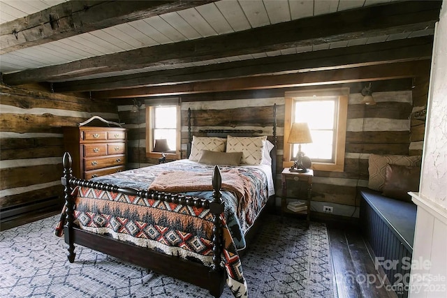 bedroom with wood ceiling, beam ceiling, hardwood / wood-style floors, and wood walls