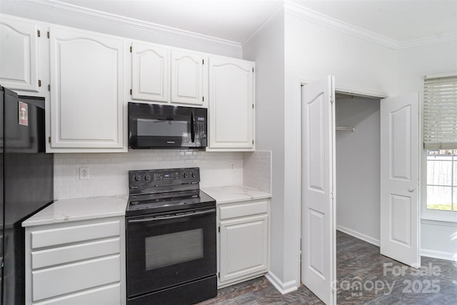 kitchen featuring white cabinetry, light stone countertops, ornamental molding, black appliances, and decorative backsplash