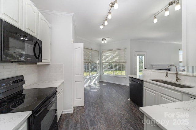 kitchen with ornamental molding, sink, white cabinets, and black appliances