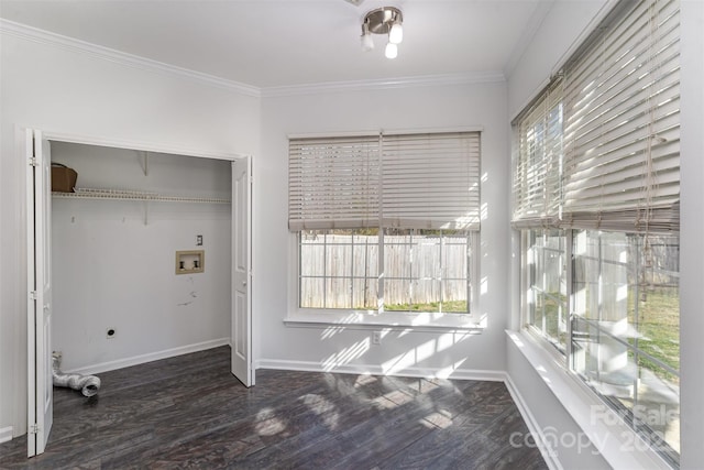 washroom with crown molding, hookup for a washing machine, dark hardwood / wood-style floors, and hookup for an electric dryer