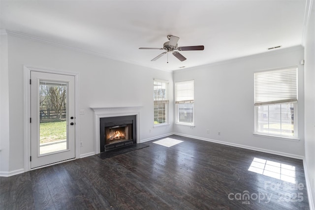 unfurnished living room with ornamental molding, dark hardwood / wood-style floors, and ceiling fan