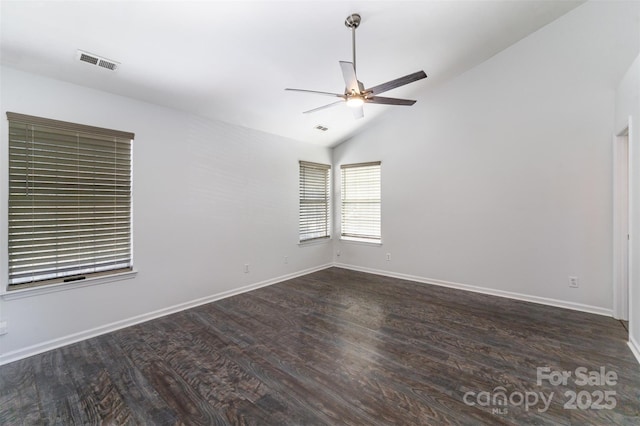 unfurnished room featuring ceiling fan, lofted ceiling, and dark hardwood / wood-style floors