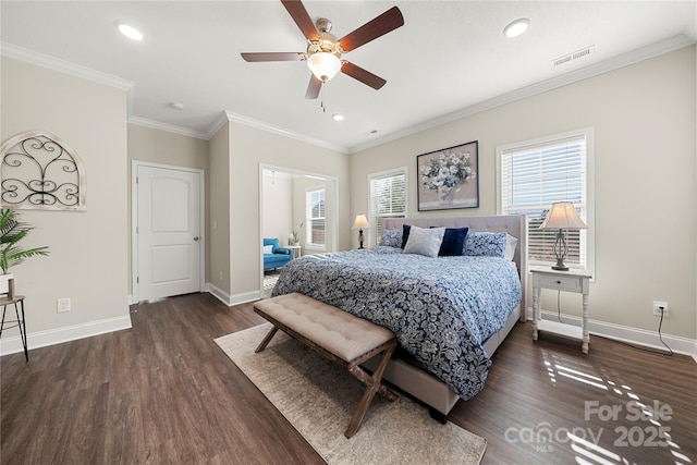 bedroom featuring crown molding, ceiling fan, and dark hardwood / wood-style floors