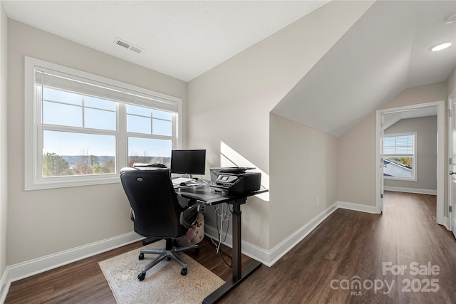 office with lofted ceiling and dark hardwood / wood-style floors