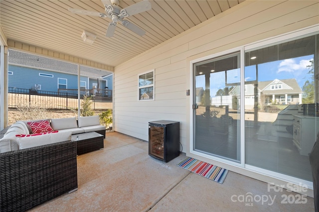 view of patio with outdoor lounge area and ceiling fan