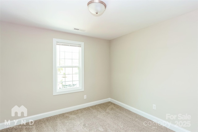 view of carpeted spare room