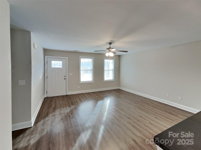 entryway featuring hardwood / wood-style flooring and ceiling fan