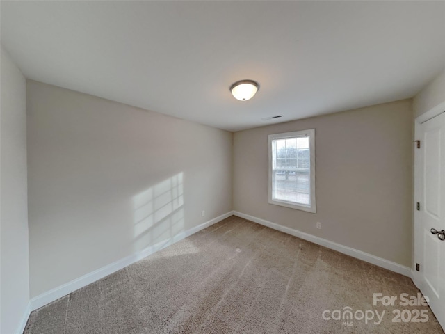 view of carpeted spare room