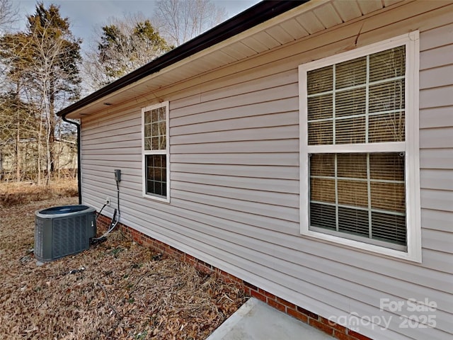 view of property exterior with cooling unit