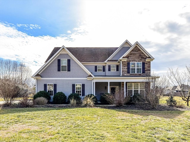 view of front of home featuring a front yard